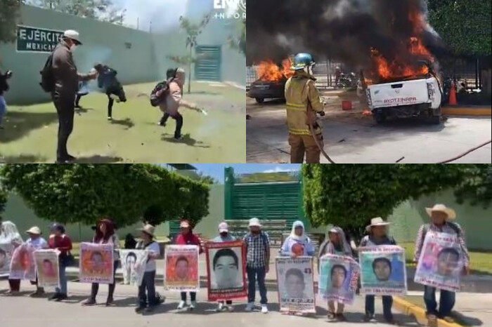 Activistas de Ayotzinapa lanzan petardos y causan incendios frente al ejército mexicano