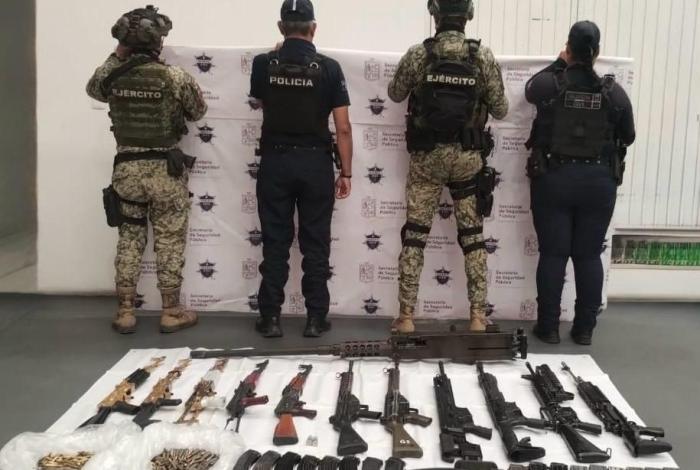 Fuerzas estatales y federales aseguran ametralladora y 11 fusiles en Huetamo: SSP