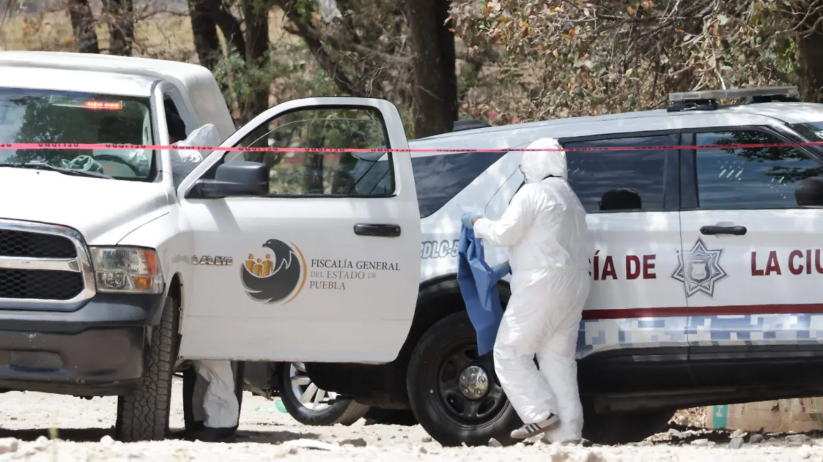Hallan a mujer sin vida dentro de un refrigerador, cerca de un panteón en Puebla