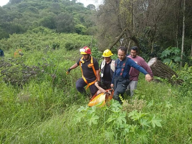 Rescatan cuerpo de joven desparecido en barranco