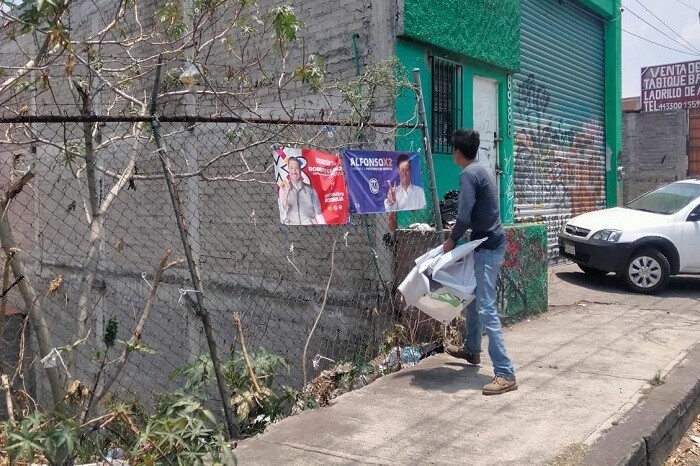 Retiran en Morelia 2 toneladas de propaganda electoral, unas 3 mil lonas