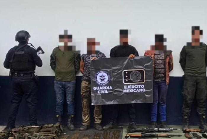 SSP y Defensa detienen a 5 hombres con arsenal en Apatzingán