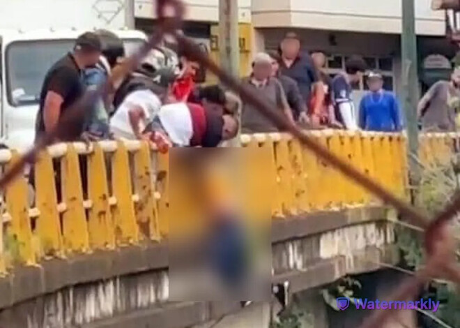 Video Ciudadanos evitan que mujer se tire de puente hacia el río Cupatizio de Uruapan